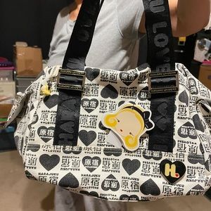 Harajuku Lover’s medium satchel bag, black/white design